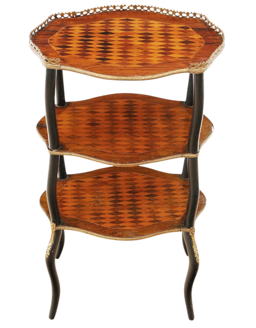 A three-tier ebonised etagere featuring diamond-pattern parquetry shelves and a pierced brass gallery edge.