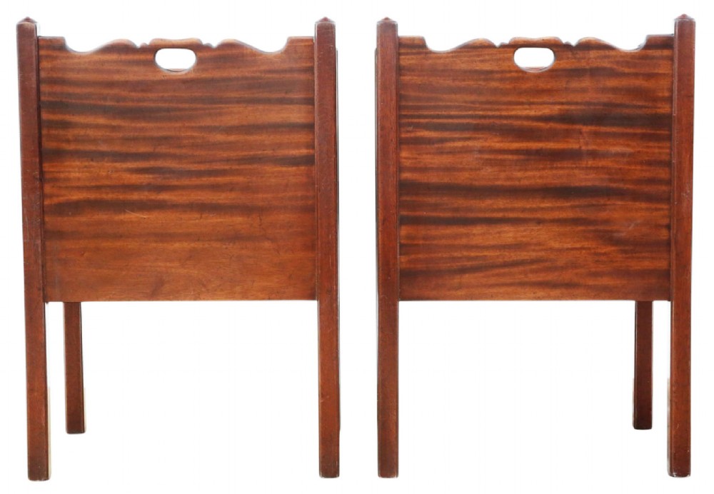 A matching pair of warm brown mahogany bedside cupboards with tray tops, double door compartments, lower drawers, and brass handles. View VIII