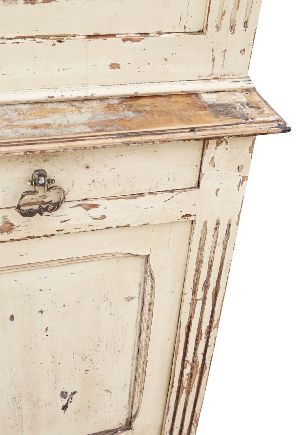 A 19th-century two-tier wooden storage cupboard painted in distressed cream, featuring fluted side details, upper and lower double doors with fielded panels, and two central drawers. View VIII