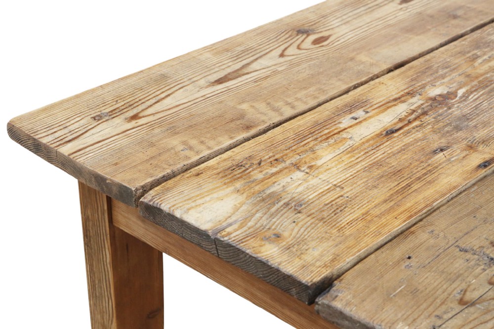 A long 19th-century pine refectory dining table featuring a three-plank top, six tapered square legs, and an H-stretcher base. View VI