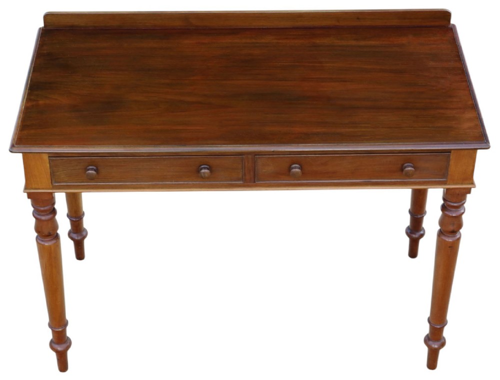 A 19th-century mahogany writing and dressing table featuring two frieze drawers with turned handles, a low gallery back, and tapered turned legs. View III