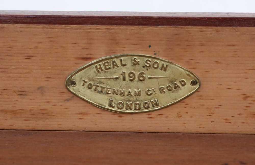 A 19th-century mahogany writing and dressing table featuring two frieze drawers with turned handles, a low gallery back, and tapered turned legs. View VI
