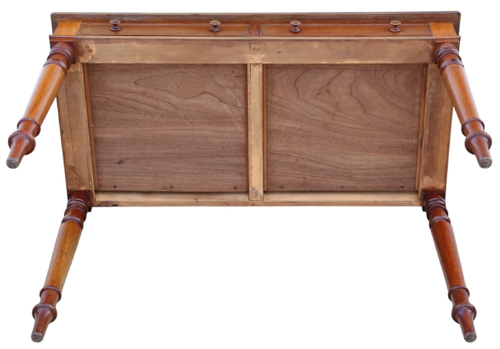 A 19th-century mahogany writing and dressing table featuring two frieze drawers with turned handles, a low gallery back, and tapered turned legs. View IX