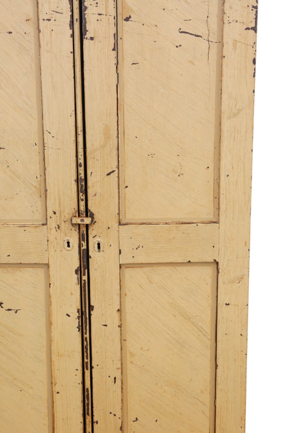 A tall, narrow 19th-century cream painted pine housekeepers cupboard featuring double panelled doors, a moulded top cornice, and distressed paintwork. View III