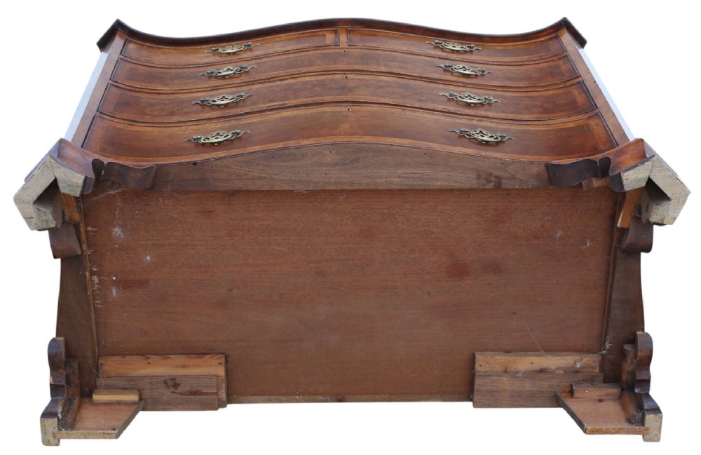 A serpentine-front burr walnut chest of drawers featuring crossbanded borders, cast brass handles, and ogee bracket feet. View VIII