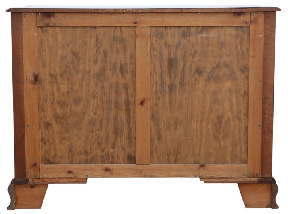 A serpentine-front burr walnut chest of drawers featuring crossbanded borders, cast brass handles, and ogee bracket feet. View IX
