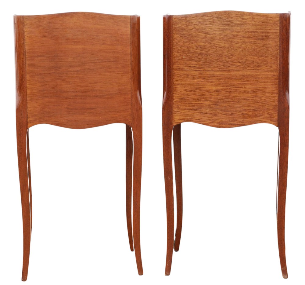 A pair of slim French style bedside tables featuring floral marquetry wood inlays, three drawers with brass handles, and slender cabriole legs. View VII