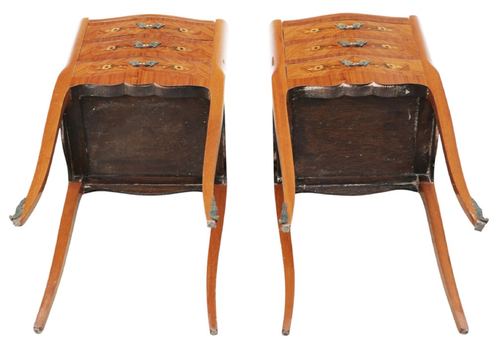 A pair of slim French style bedside tables featuring floral marquetry wood inlays, three drawers with brass handles, and slender cabriole legs. View VIII