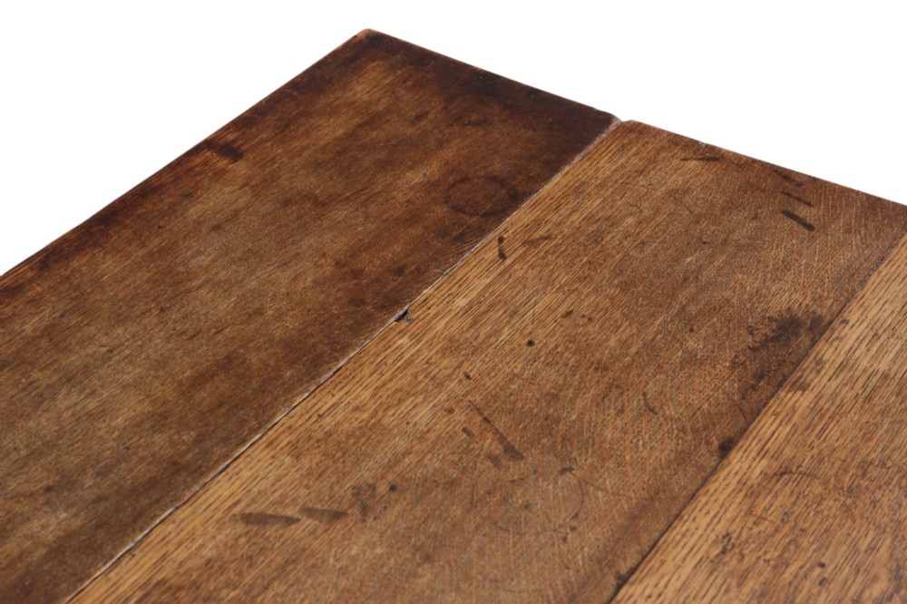 A Georgian oak drop-leaf Pembroke table featuring turned legs, a single end drawer, and brass castors. View IV