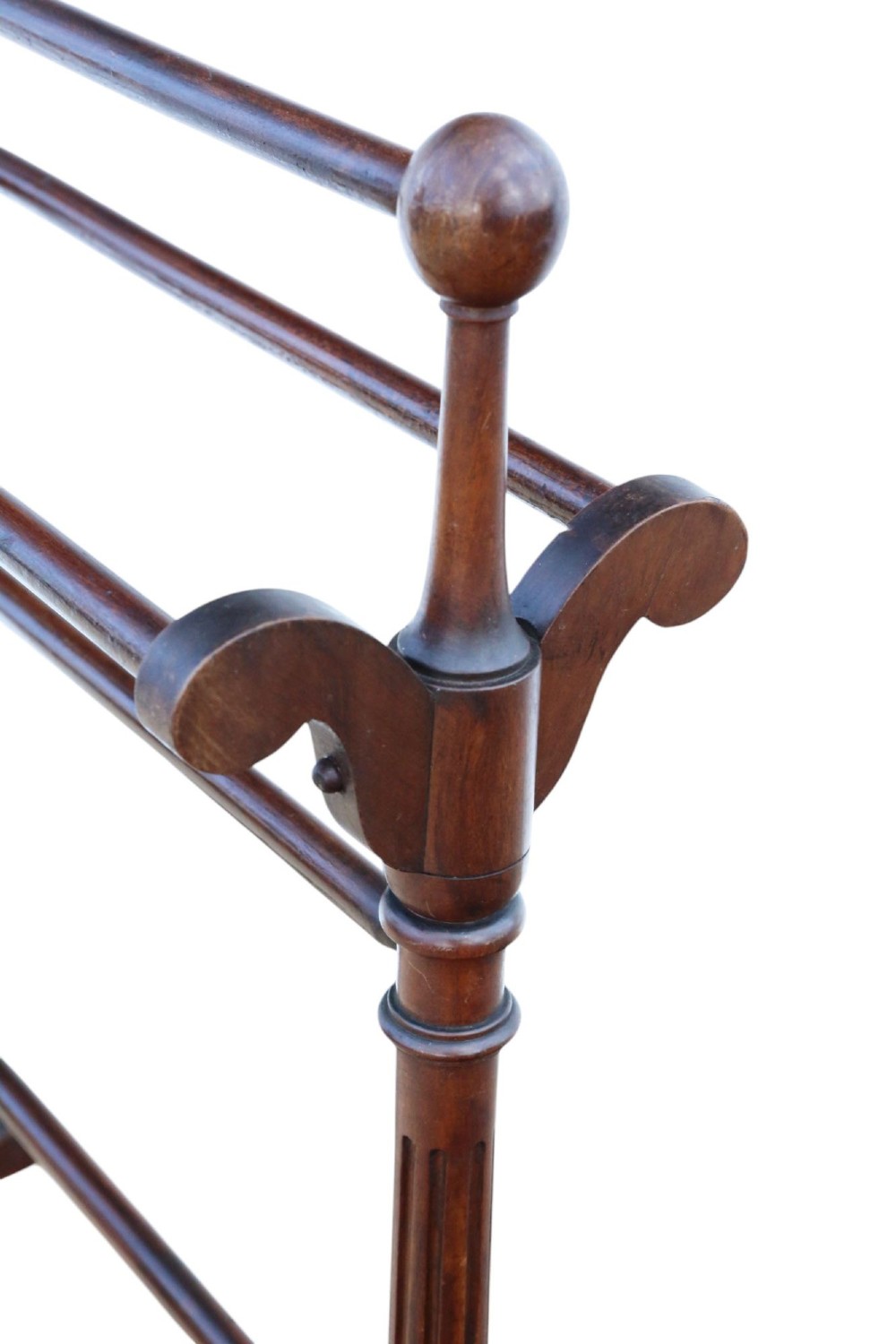 A Victorian mahogany freestanding towel rail featuring turned top finials, multiple horizontal rails, fluted upright supports, and carved scroll feet. View III