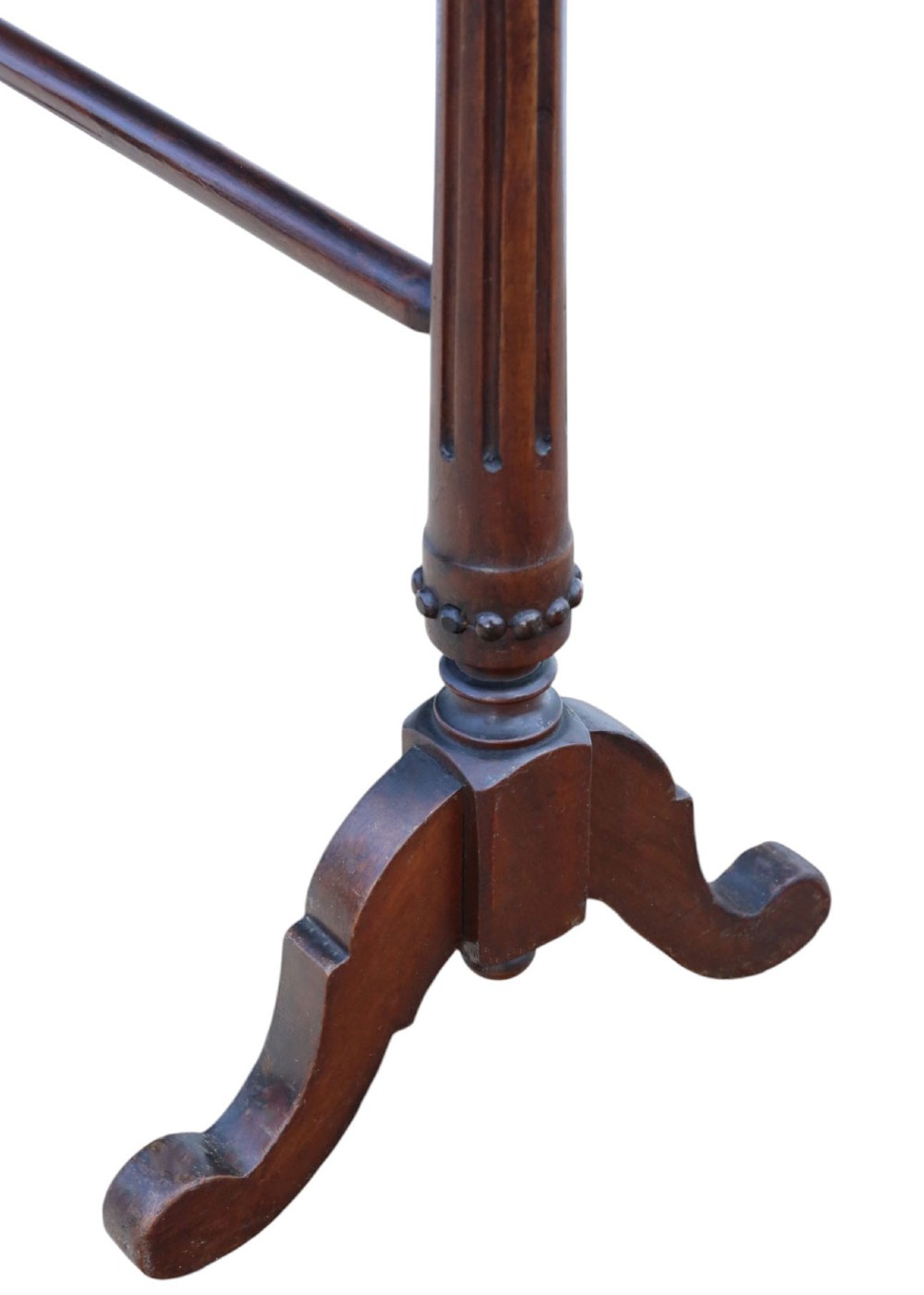 A Victorian mahogany freestanding towel rail featuring turned top finials, multiple horizontal rails, fluted upright supports, and carved scroll feet. View V