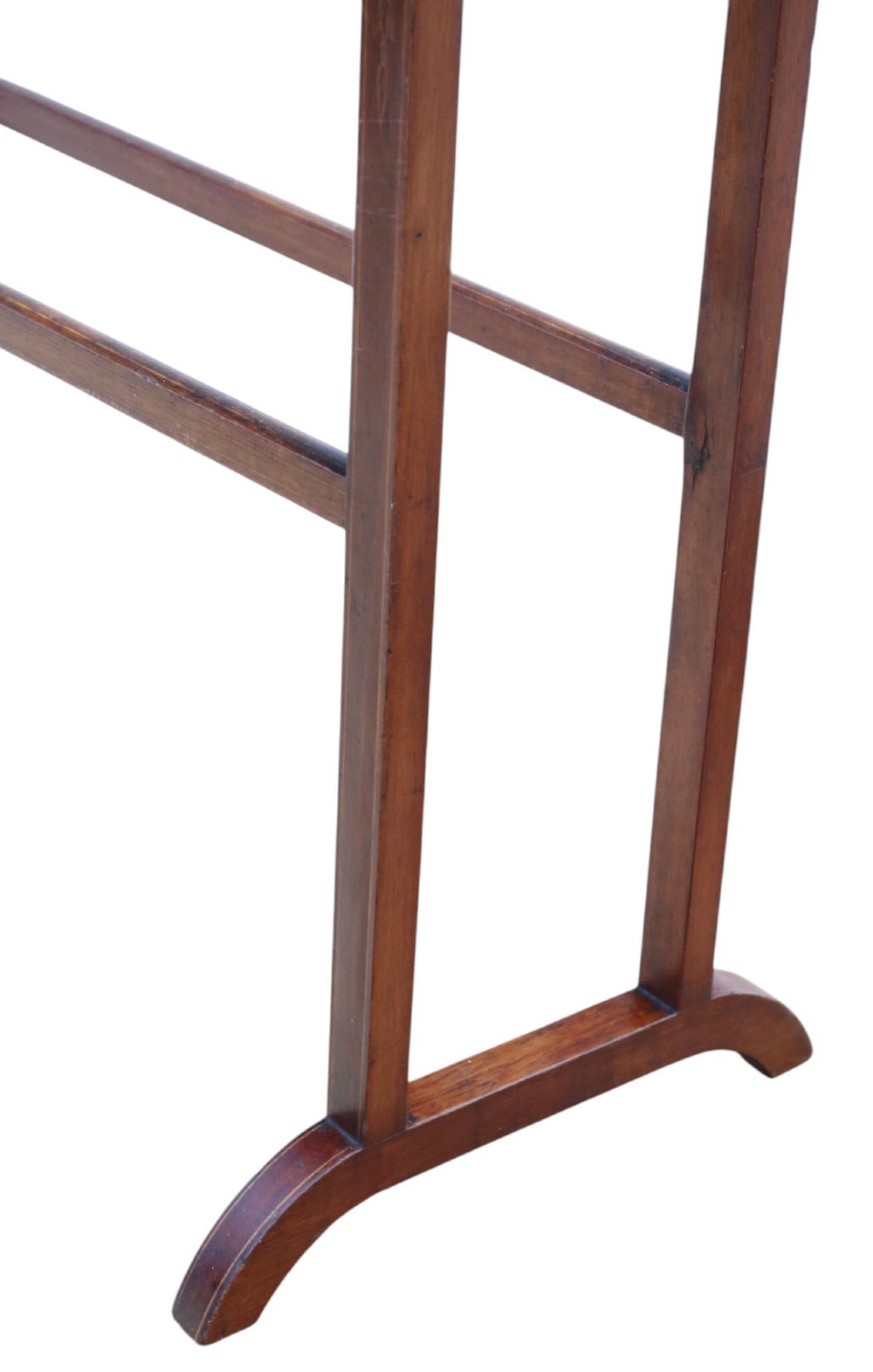 An Edwardian mahogany towel rail featuring arched side supports, fine line inlay, three upper hanging bars, lower stretchers, and splayed feet. View V