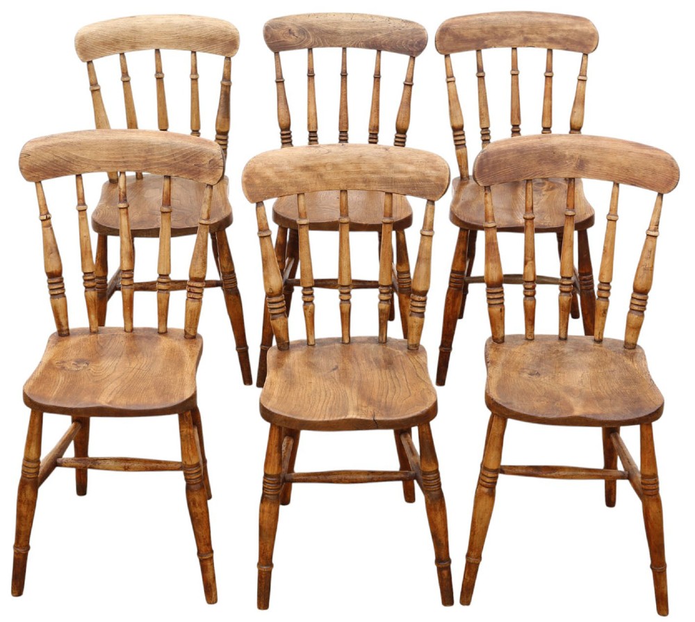 A harlequin set of ten 19th-century Victorian dining chairs crafted from elm and beech wood, featuring spindle backs, curved top rails, turned legs, and stretchers. View III