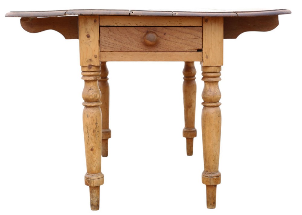 A 19th-century Victorian pine drop-leaf table featuring turned legs, a planked top surface, and a single end drawer with a wooden knob handle. View VI