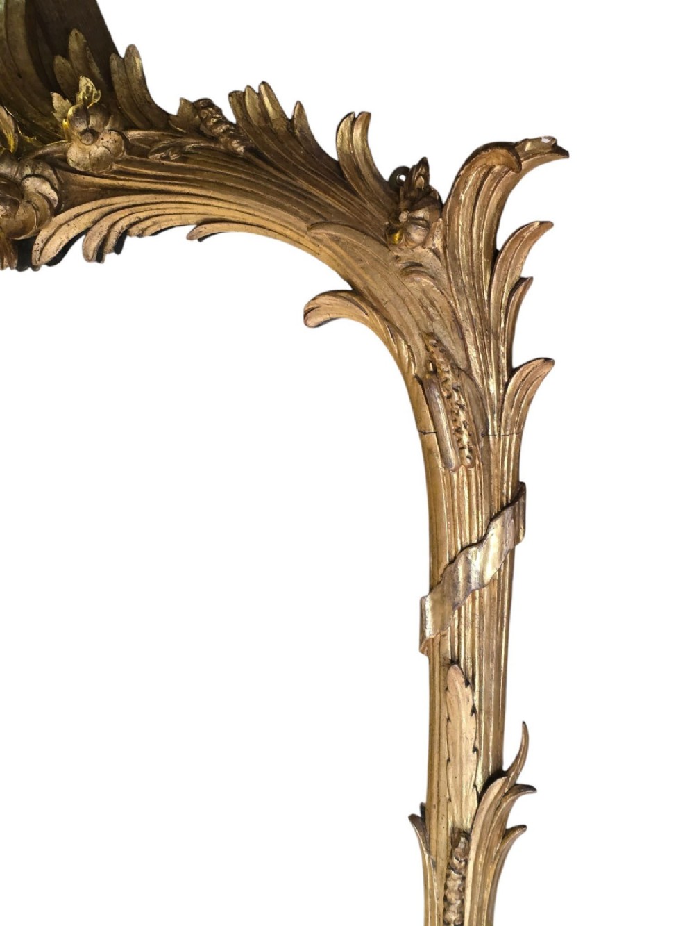 A large 19th-century tall wall mirror featuring an ornate gilded wood frame with hand-carved acanthus leaf cresting and scrollwork. View IV