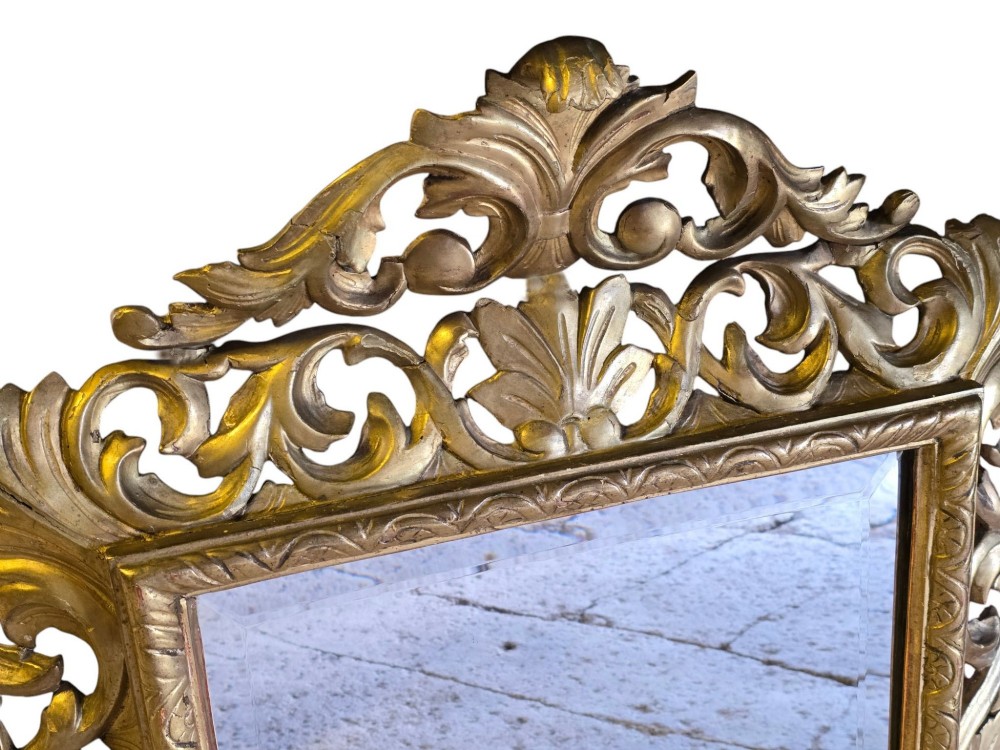 A rectangular 19th-century Florentine wall mirror featuring a carved openwork giltwood frame with scrolling acanthus leaves. View III