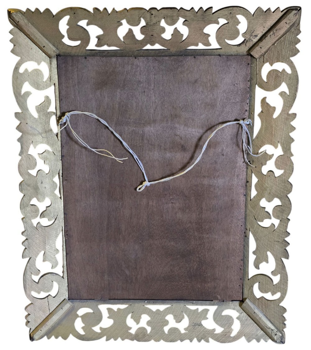 A rectangular bevelled glass mirror set within an intricately carved gold giltwood frame with openwork acanthus leaves and scrollwork. View VII