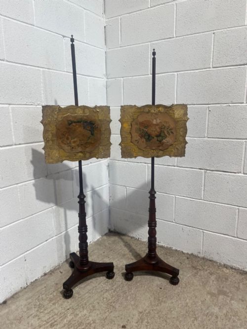 A Pair Of Antique Regency Mahogany Pole Screens