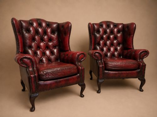 A Pair of Antique Chesterfield Wing Chairs