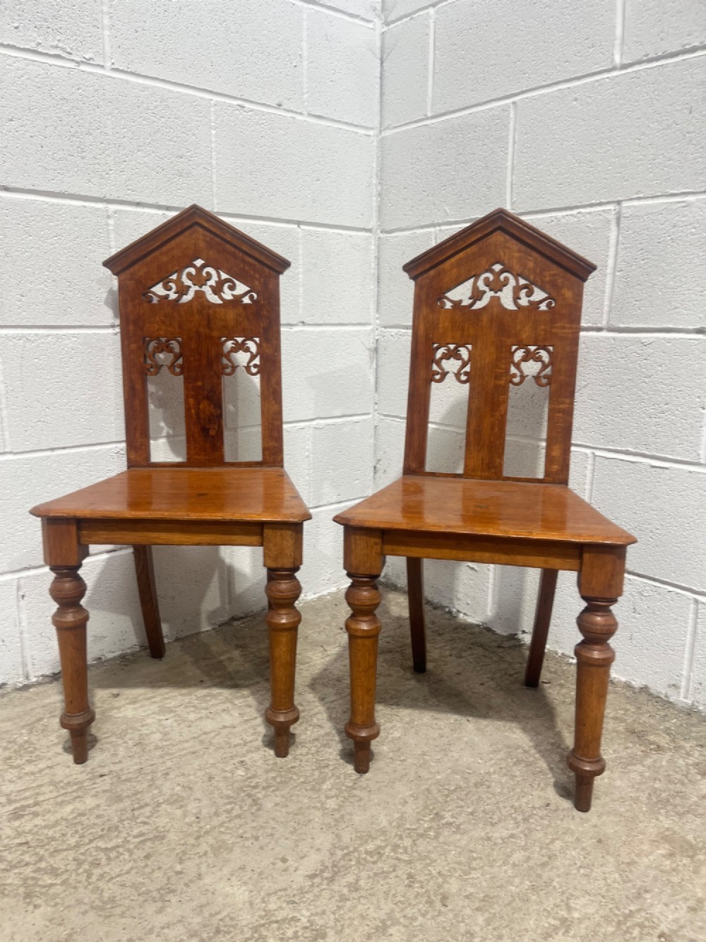 A Pair Of Antique 19th Century Oak Hall Chairs