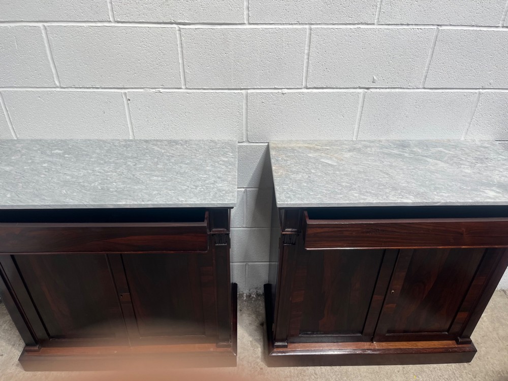 A pair of 19th-century rosewood cupboards featuring dark figured wood grain, double panelled doors, and grey marble tops. View VIII
