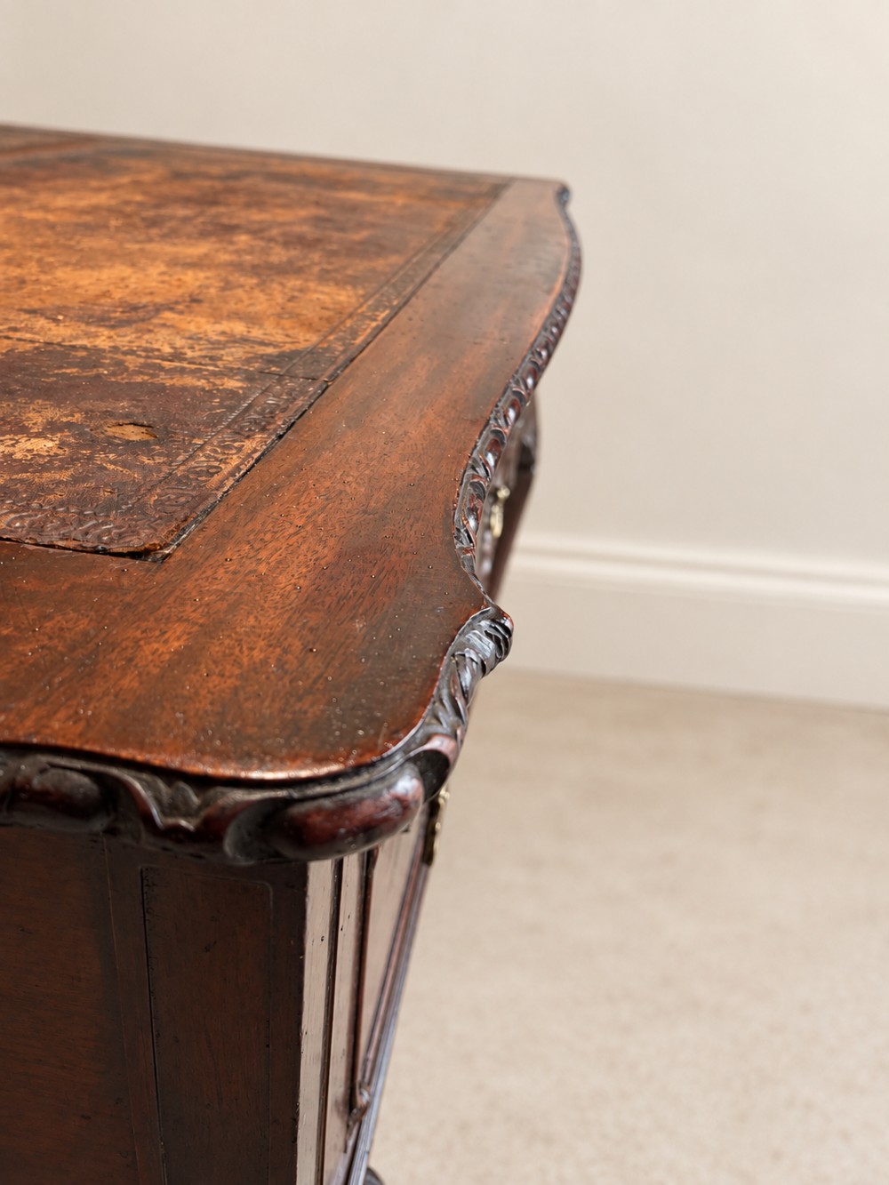 A dark mahogany writing table featuring three drawers, a carved shell apron, and cabriole legs with ball-and-claw feet. View VIII