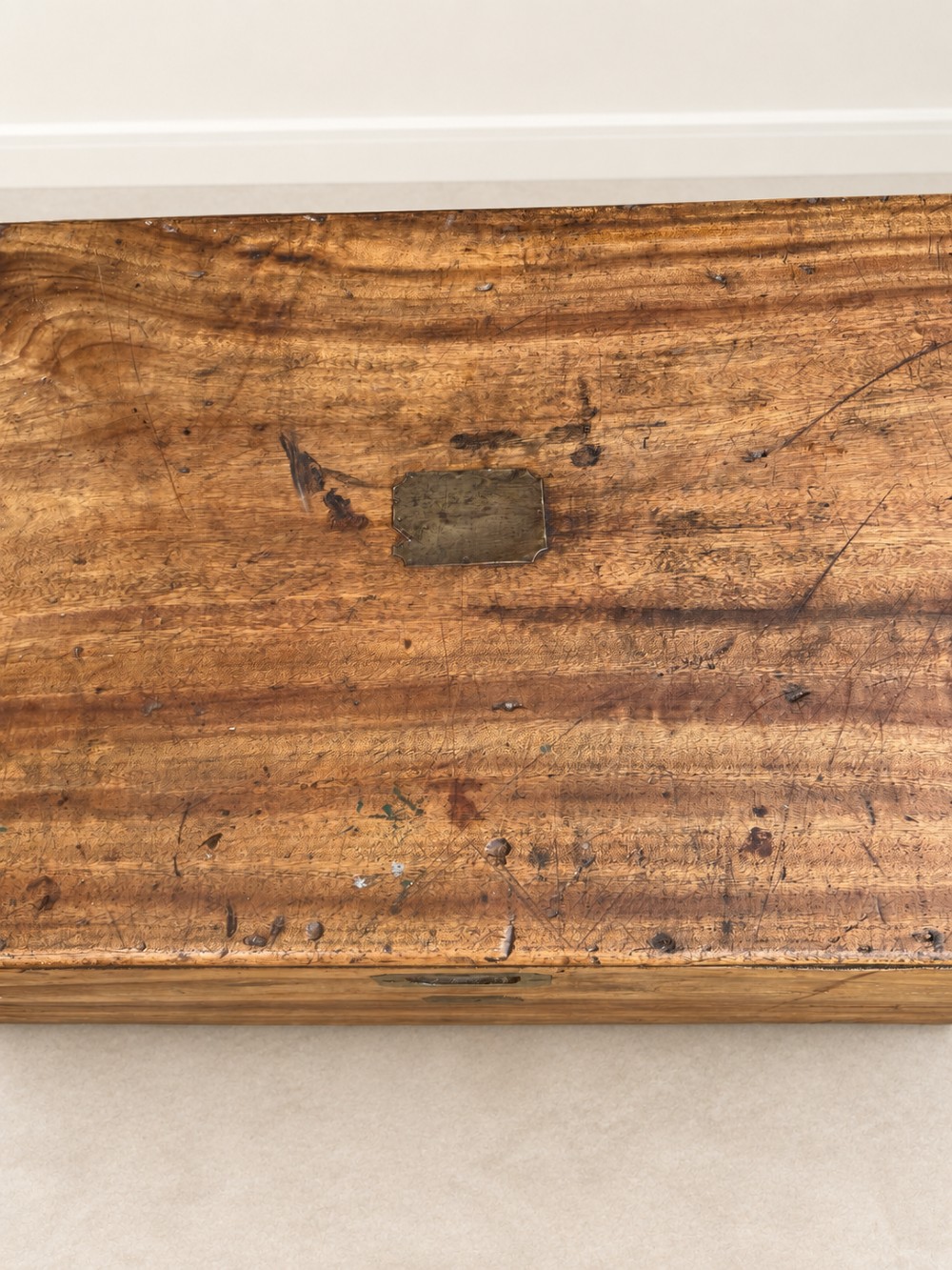 A 19th-century rectangular wooden campaign chest featuring protective brass corner brackets, flush carrying handles, and a hinged lid. View VIII
