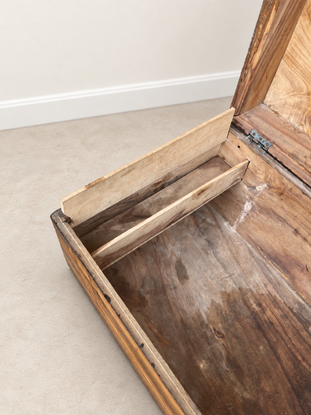 A 19th-century rectangular wooden campaign chest featuring protective brass corner brackets, flush carrying handles, and a hinged lid. View IX
