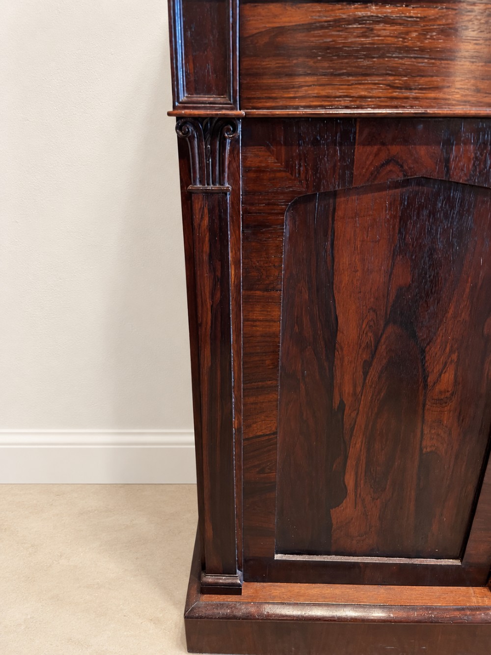 A pair of 19th-century Regency dark rosewood cupboards featuring white marble tops and panelled double doors on plinth bases. View IX