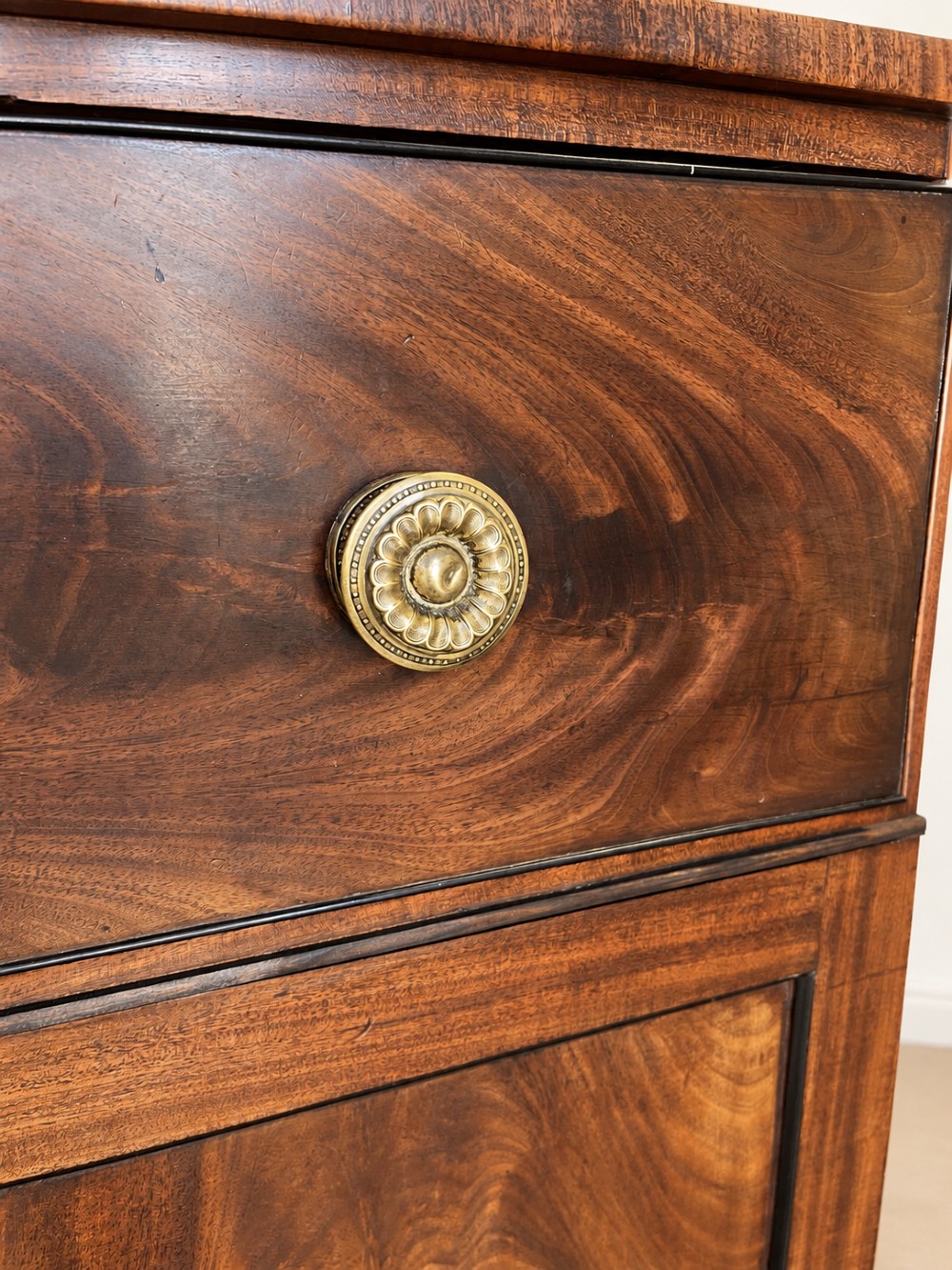 A tall 19th-century mahogany secretaire bookcase featuring upper glazed doors with Gothic arched astragal glazing, a deep drawer, and a lower two-door cupboard standing on turned feet. View VIII