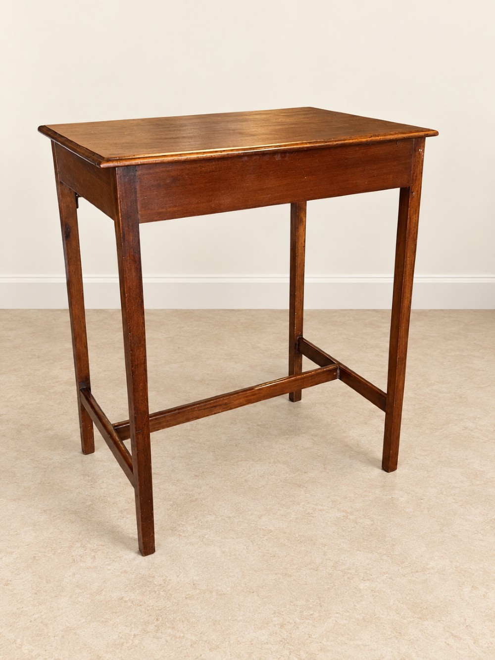 A 19th-century mahogany side table featuring a single drawer with twin brass ring drop handles and straight legs joined by low stretchers. View VIII