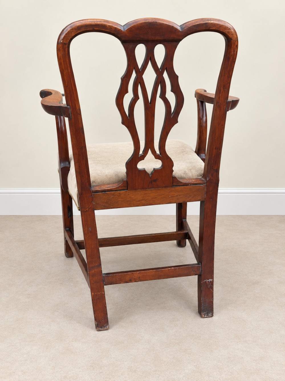 A Georgian yew wood armchair featuring a pierced back splat, curved arms, square legs with stretchers, and a neutral velvet upholstered seat. View VIII