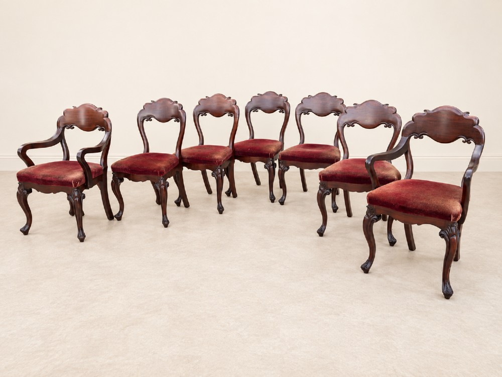 A set of eight 19th-century Victorian mahogany balloon back chairs with red velvet upholstery, including six side chairs and two carver armchairs with cabriole front legs. View III