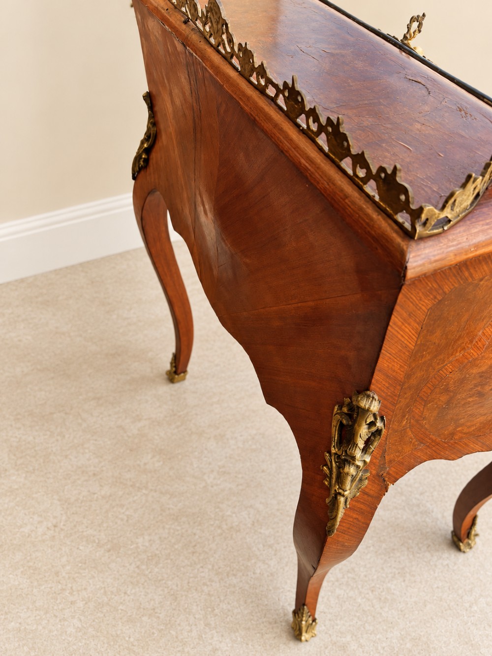 A 19th-century French Louis XV style walnut slant-front writing bureau featuring marquetry veneer, ornate gilt-bronze mounts, a brass pierced gallery, and long cabriole legs. View VIII