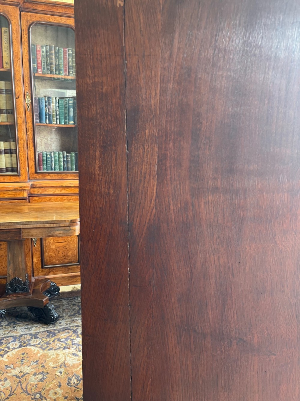 An antique Georgian oak chest on chest featuring two small top drawers over five full-width graduated drawers with brass swan-neck handles and bracket feet. View XIV