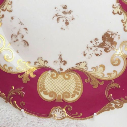 fig 1. H and R Daniel shell shape dessert/cabinet plate, deep pink/red