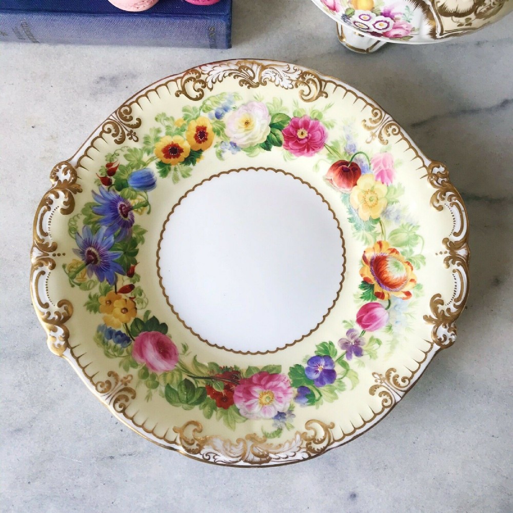 An antique Copeland bread or cake plate decorated with handpainted flowers