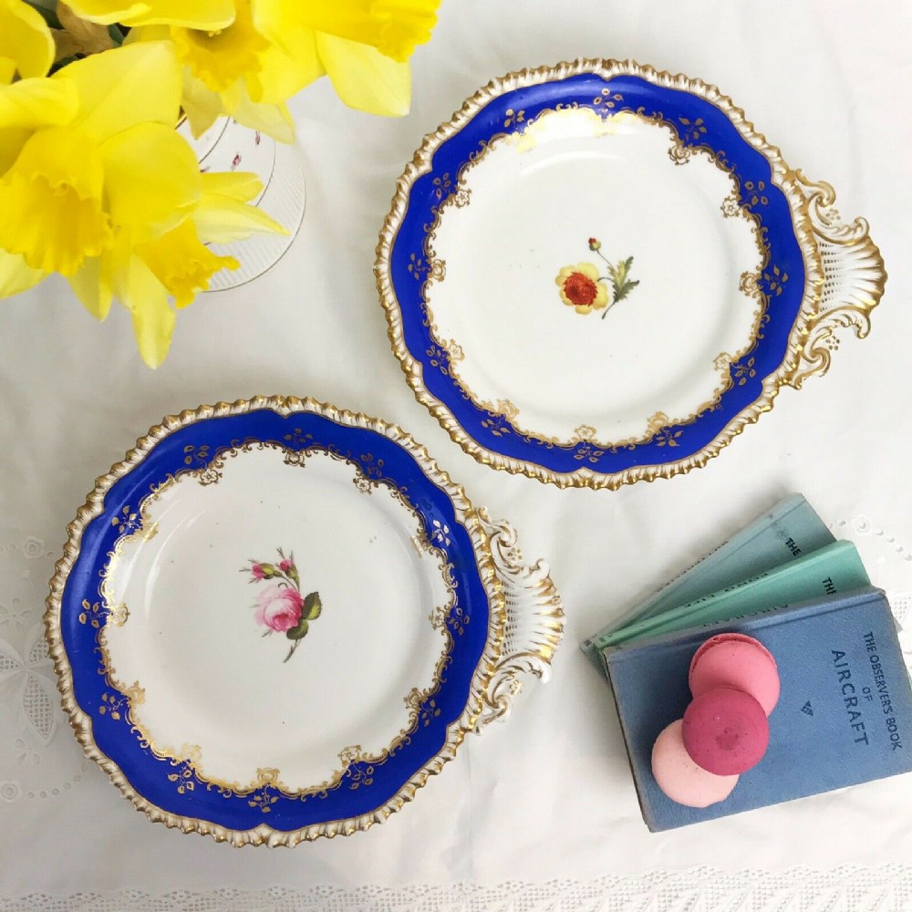 Pair of antique Coalport dessert service handled serving dishes, gadrooned edge