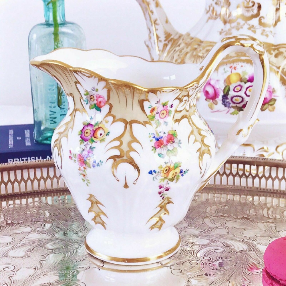 Antique Ridgway foliage shape milk jug, handpainted flowers