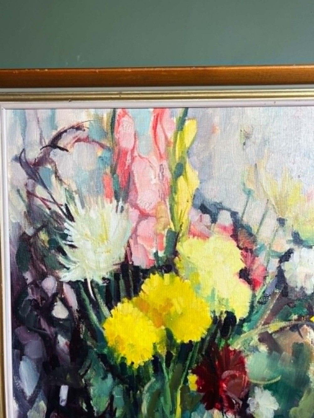 A framed mid-century oil on board painting featuring a colourful floral still life composition with yellow, pink, and green tones set within a wooden frame. View VII