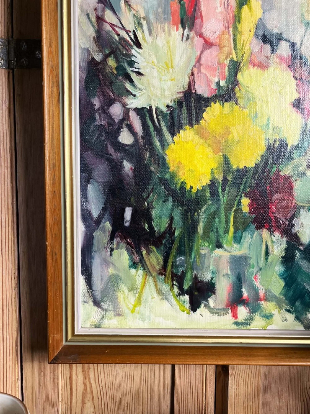 A framed mid-century oil on board painting featuring a colourful floral still life composition with yellow, pink, and green tones set within a wooden frame. View XIII