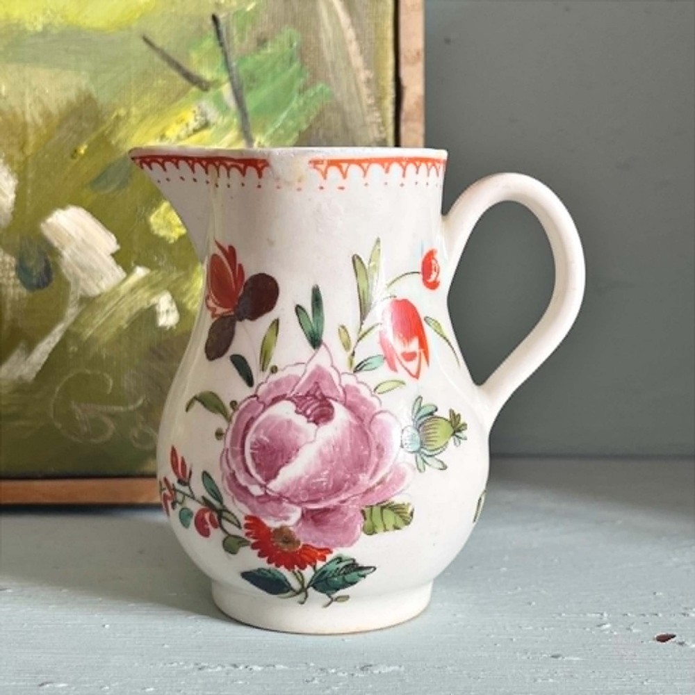 Antique Bow porcelain Sparrowbeak creamer jug with polychrome flowers, c.1760