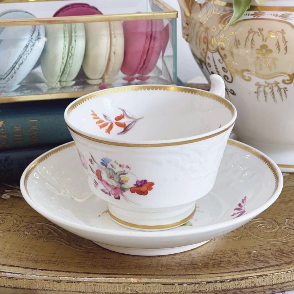 Spode London shape teacup & saucer with Nantgarw type moulding & handpainted flowers