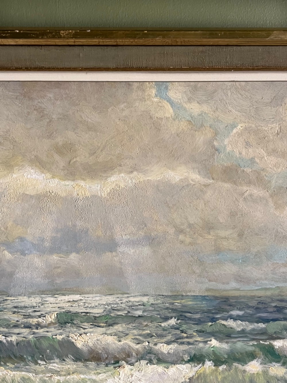 A framed oil painting depicting crashing ocean waves against coastal rocks under an overcast sky, signed by artist Sidney A. Court. View VII