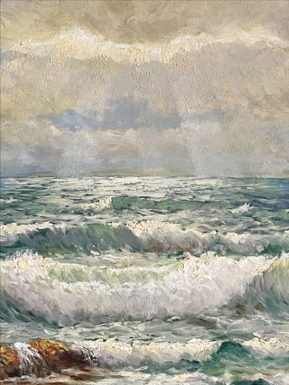 A framed oil painting depicting crashing ocean waves against coastal rocks under an overcast sky, signed by artist Sidney A. Court. View IX