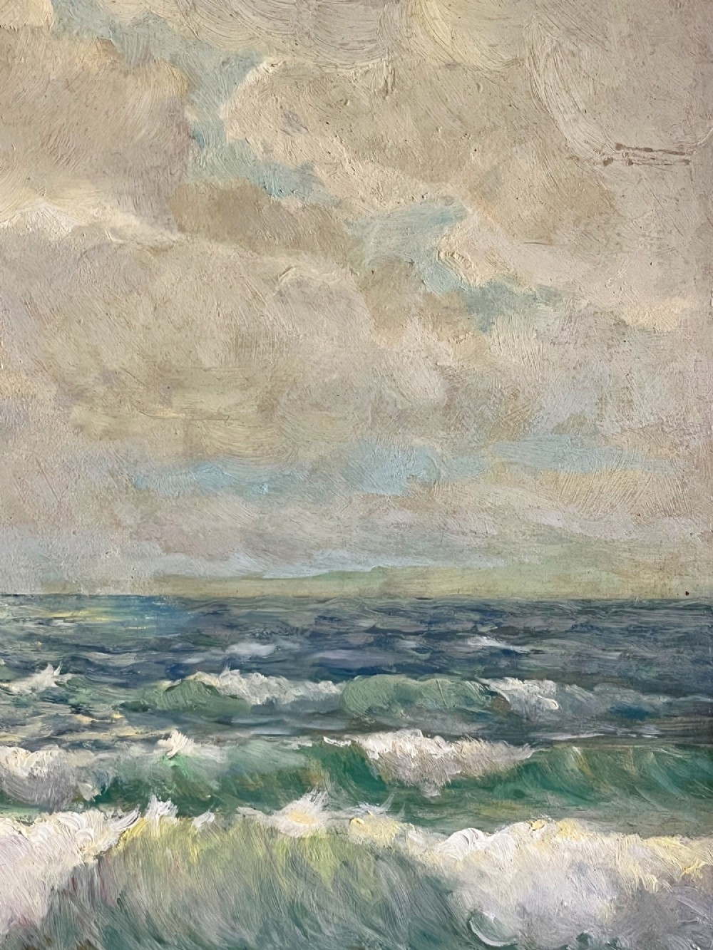 A framed oil painting depicting crashing ocean waves against coastal rocks under an overcast sky, signed by artist Sidney A. Court. View X