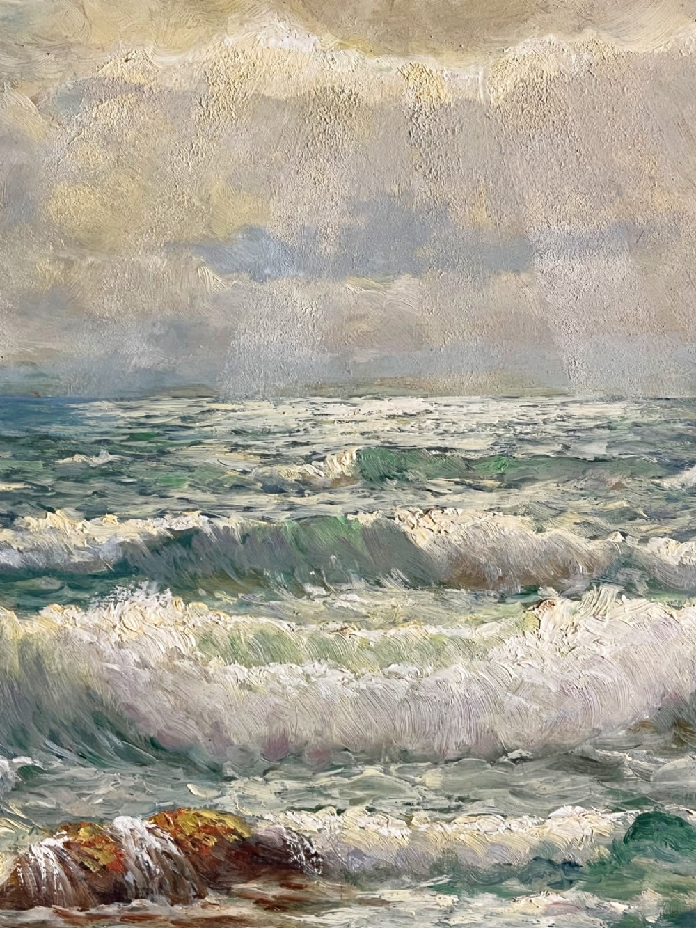 A framed oil painting depicting crashing ocean waves against coastal rocks under an overcast sky, signed by artist Sidney A. Court. View XV