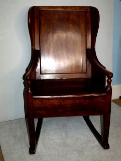 A MID TO LATE 18TH CENTURY LADIES ELM WINGED BACK FIRESIDE ROCKING CHAIR