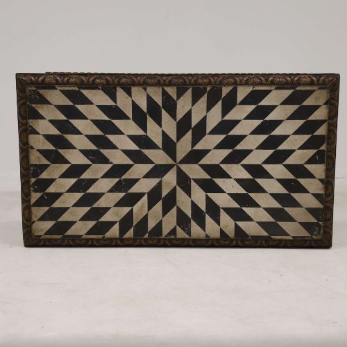 fig 9. A 19th-century carved oak centre table featuring turned baluster legs, a stretcher base, and a geometric black and white painted starburst top.