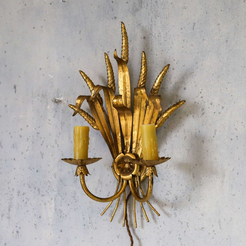 A mid-century gilt metal wall sconce crafted in the form of a wheat sheaf with two candle arms. View IV